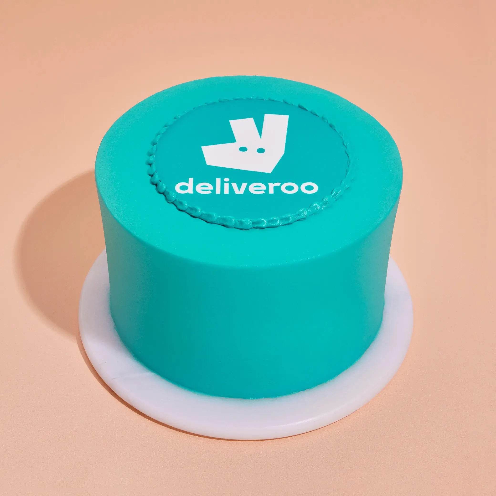 Corporate Colour Matched Cake with Logo featuring edible Deliveroo logo plaque by Crumbs & Doilies
