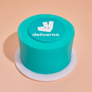 Turquoise cake with 'deliveroo' logo 
