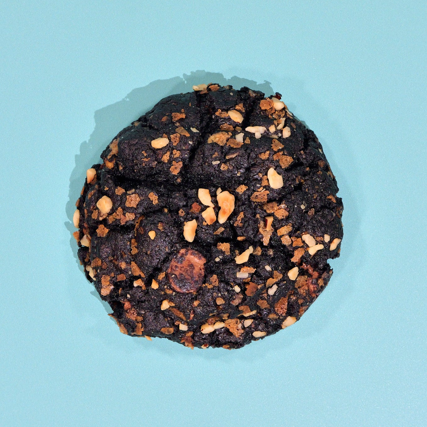 Ferrero Rocher New York Cookie topped with hazelnuts and chocolate chips Crumbs & Doilies