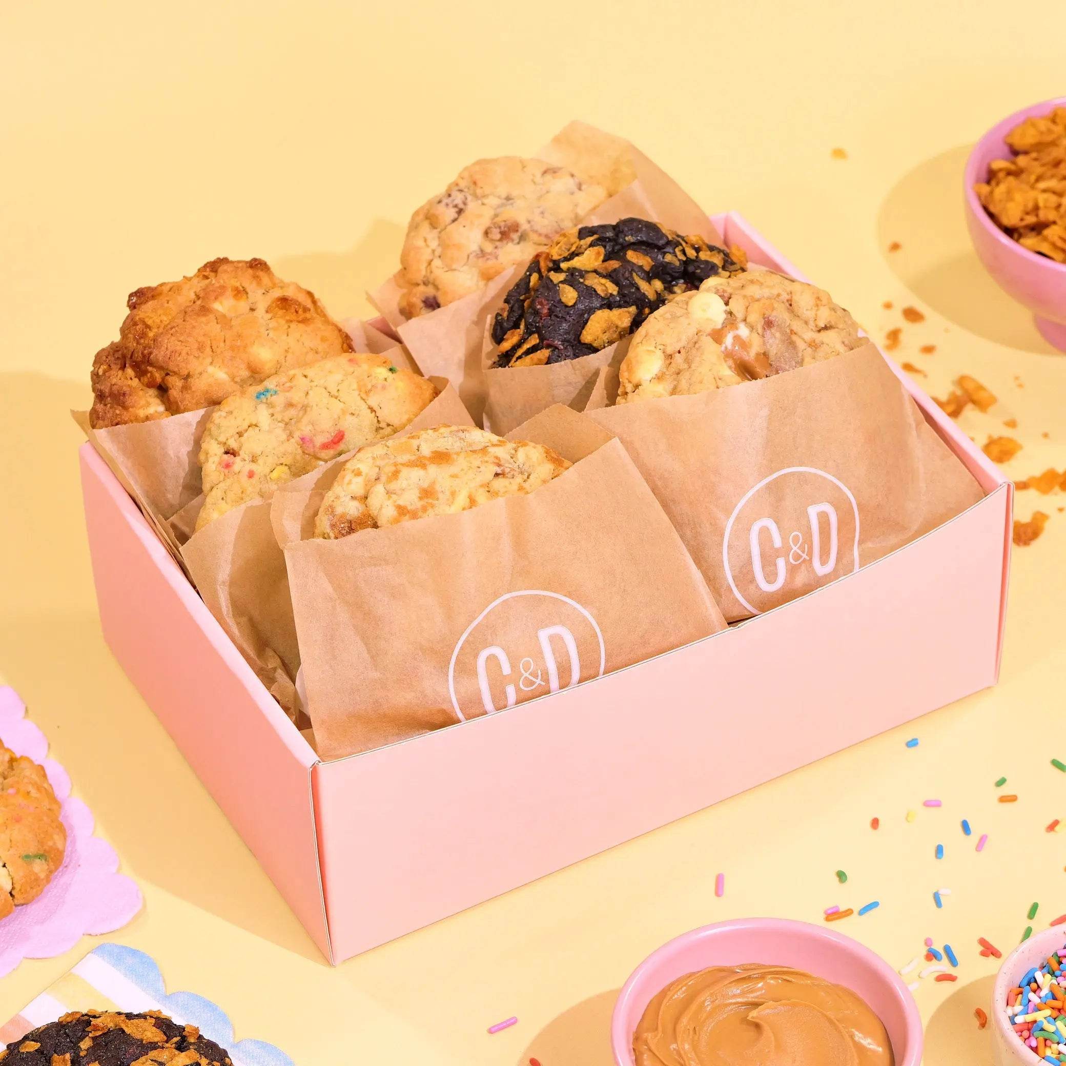 6 x New York Cookies The Ultimate Favourites assortment by Crumbs & Doilies in pink box with six varieties