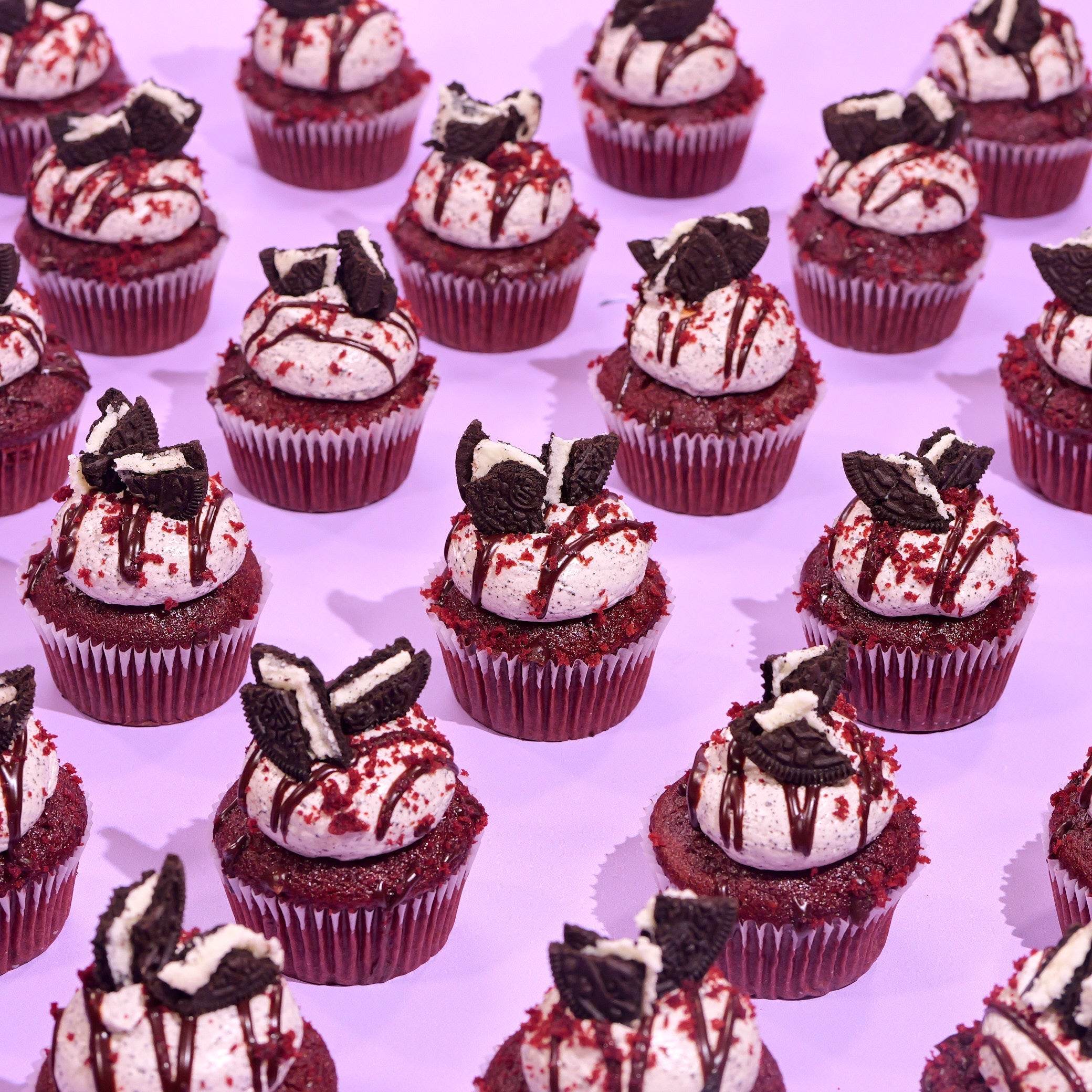 Vegan Red Velvet Volcano Cupcakes with Oreo topping and chocolate drizzle by Crumbs & Doilies