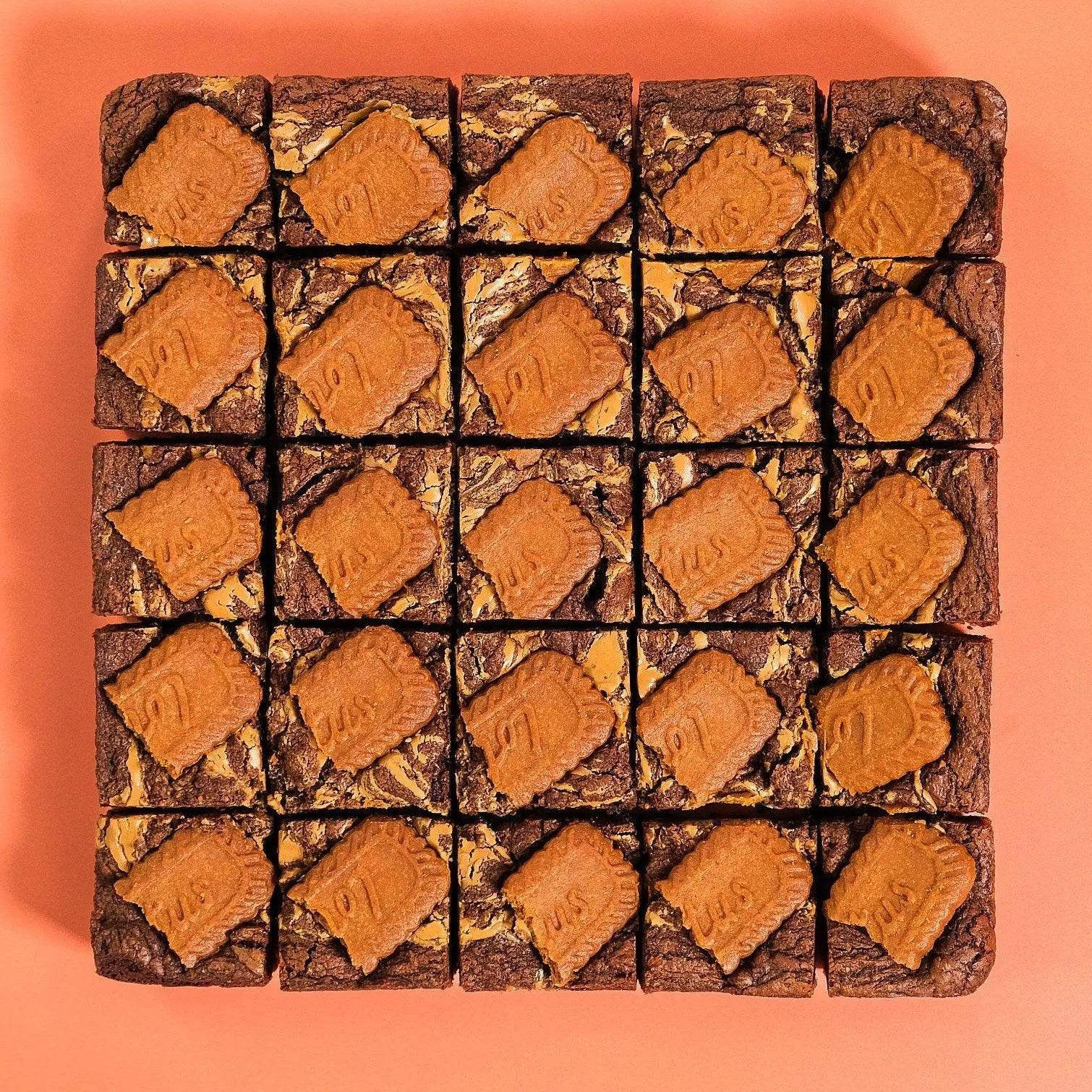 Biscoff Brownie with Lotus biscuit topping arranged in square pieces Crumbs & Doilies
