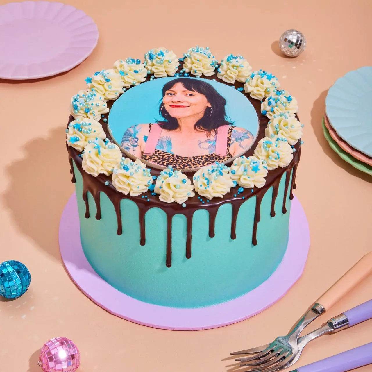 Personalised Edible Image Photo Cake with blue icing, chocolate drip, white cream, and blue sprinkles Crumbs & Doilies